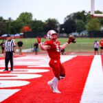 Wrublik Scores Record Five Rushing TD in Homecoming Win